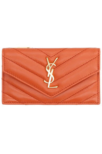 Saint Laurent women’s card holder in coral quilted leather with gold-tone YSL logo clasp in Cassandras red
