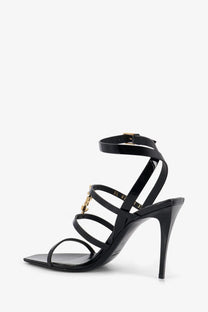 Saint Laurent women’s Cassandre black patent leather strappy high-heeled sandals with gold-tone hardware