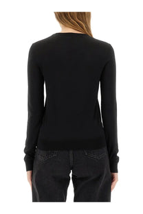 Saint Laurent women’s Cassandre black long-sleeved knit sweater with round neckline and ribbed cuffs