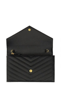 Saint Laurent women’s envelope cassandre wallet in black quilted leather with gold-tone chevron hardware