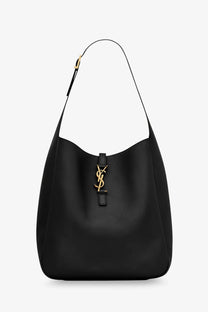 Saint Laurent women’s black leather shoulder bag with gold-tone YSL logo clasp in hammered leather texture
