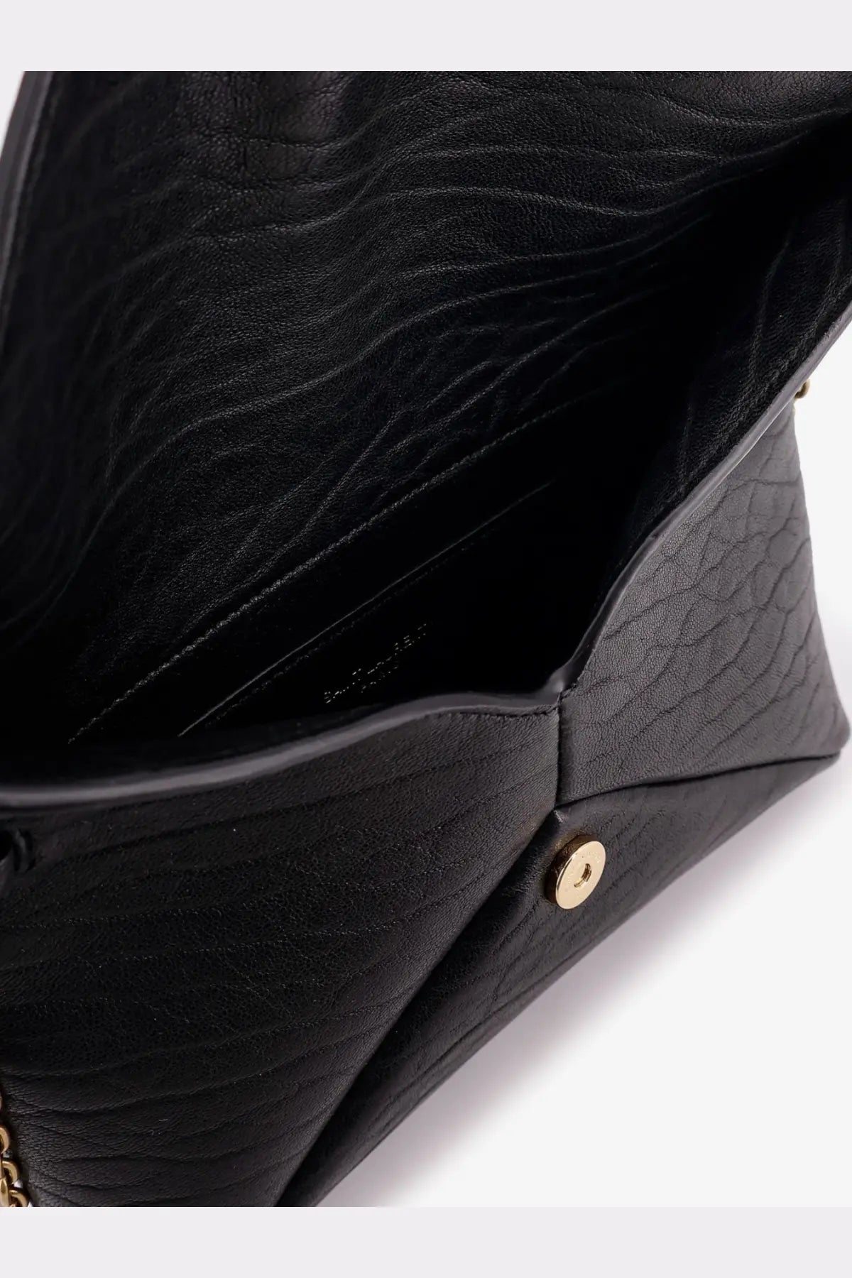 Saint Laurent women’s black leather crossbody bag with textured crocodile-patterned clutch and gold-tone button closure
