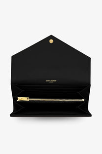 Saint Laurent women’s black leather wallet with gold-tone zipper and clasp for stylish daily use