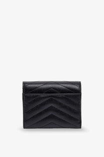 Saint Laurent women’s black leather wallet featuring a distinctive quilted chevron pattern