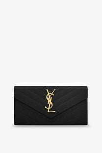 Black quilted leather Saint Laurent women’s wallet with gold-tone YSL monogram logo front view