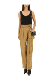 Tan high-waisted trousers with self-tie belt and cuffed hems paired with saint laurent women’s black lurex knit tank top