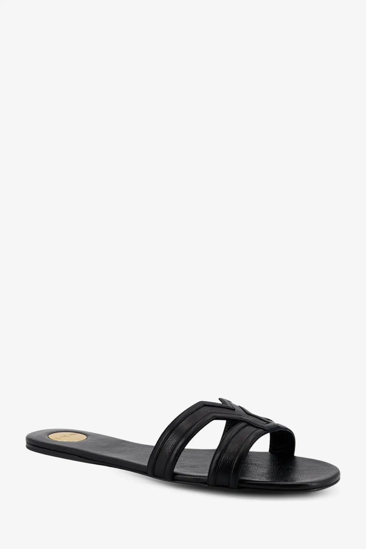 Saint Laurent women’s Mabrouka black leather slide sandal with minimalist design and small gold insole logo