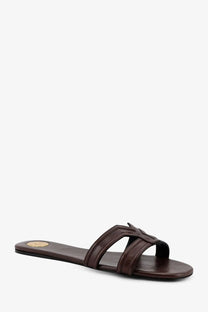 Saint Laurent women’s mabrouka brown leather slide sandal with braided strap and gold-toned circular logo on insole