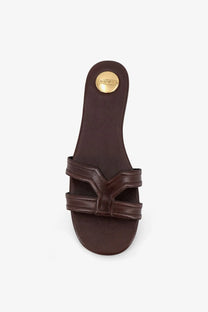 Brown leather saint laurent mabrouka women’s slide sandal with gold-tone ysl logo plaque on the heel back view
