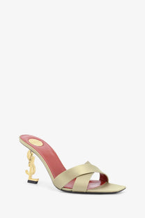 Saint Laurent women’s opyum gold satin strap mule sandal with distinctive gold ysl logo heel visible from back side