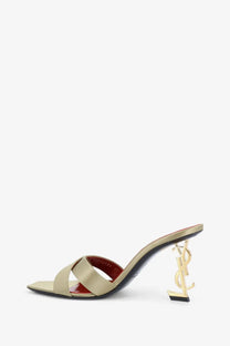 Beige satin strap mule sandal with gold-tone ysl logo heel by Saint Laurent women’s Opyum satin sandals