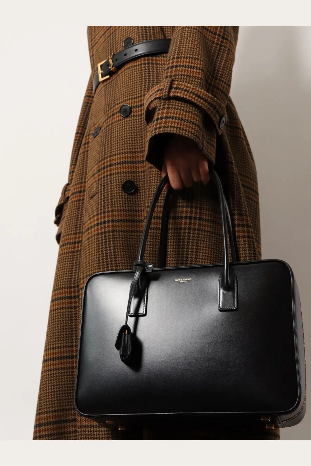 Saint Laurent women’s sac de jour black leather satchel with structured rectangular shape and top handles
