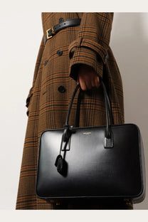 Saint Laurent women’s sac de jour black leather satchel with structured rectangular shape and top handles