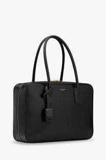 Saint Laurent women’s sac de jour black leather tote bag with gold-tone hardware and minimalist design