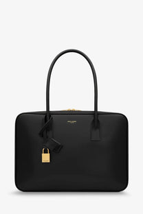 Saint Laurent women’s sac de jour black leather tote bag with gold-tone hardware and matching padlock