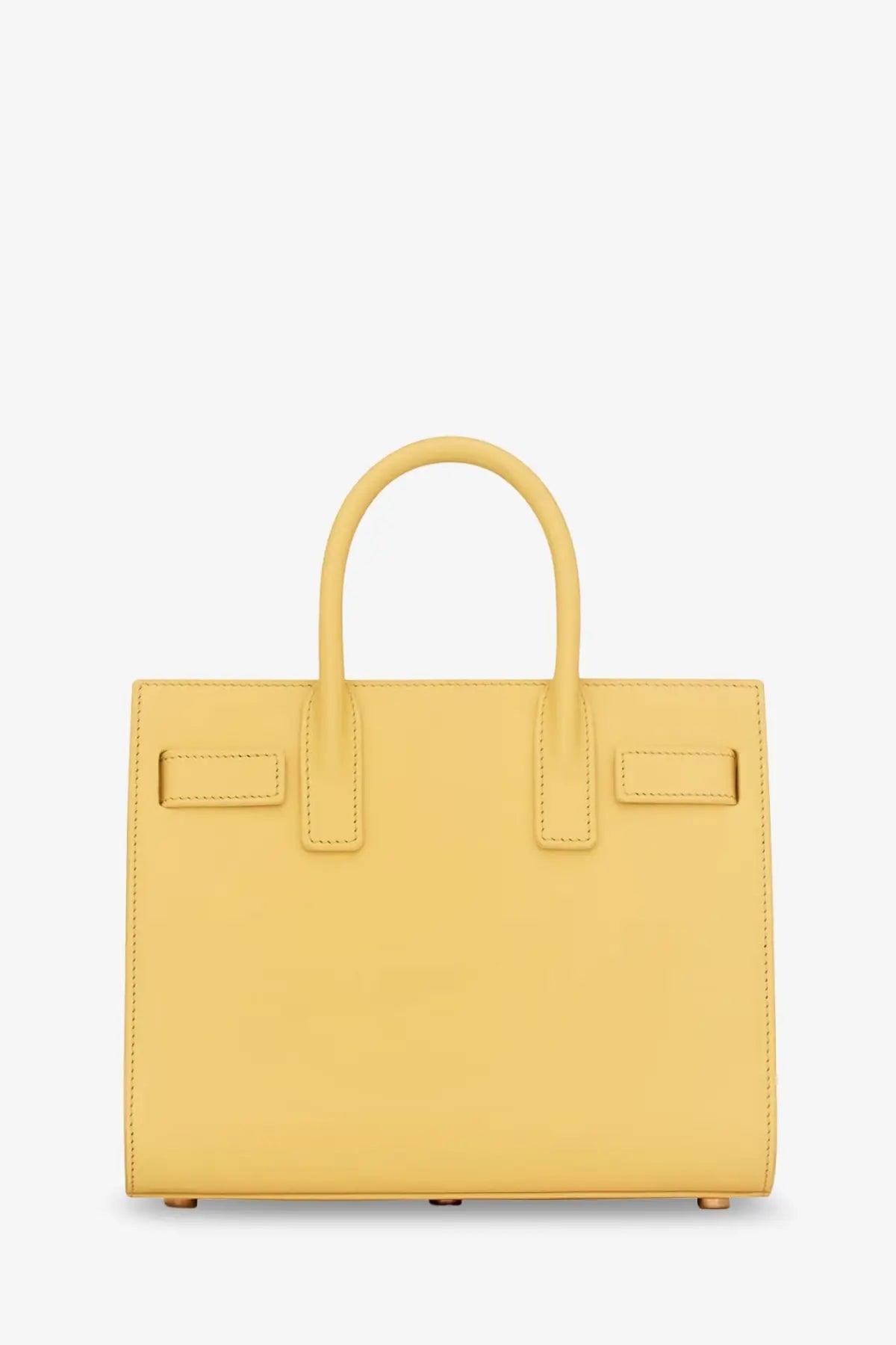 Saint Laurent women’s sac de jour nano leather crossbody bag in mustard yellow with a sleek minimalist design