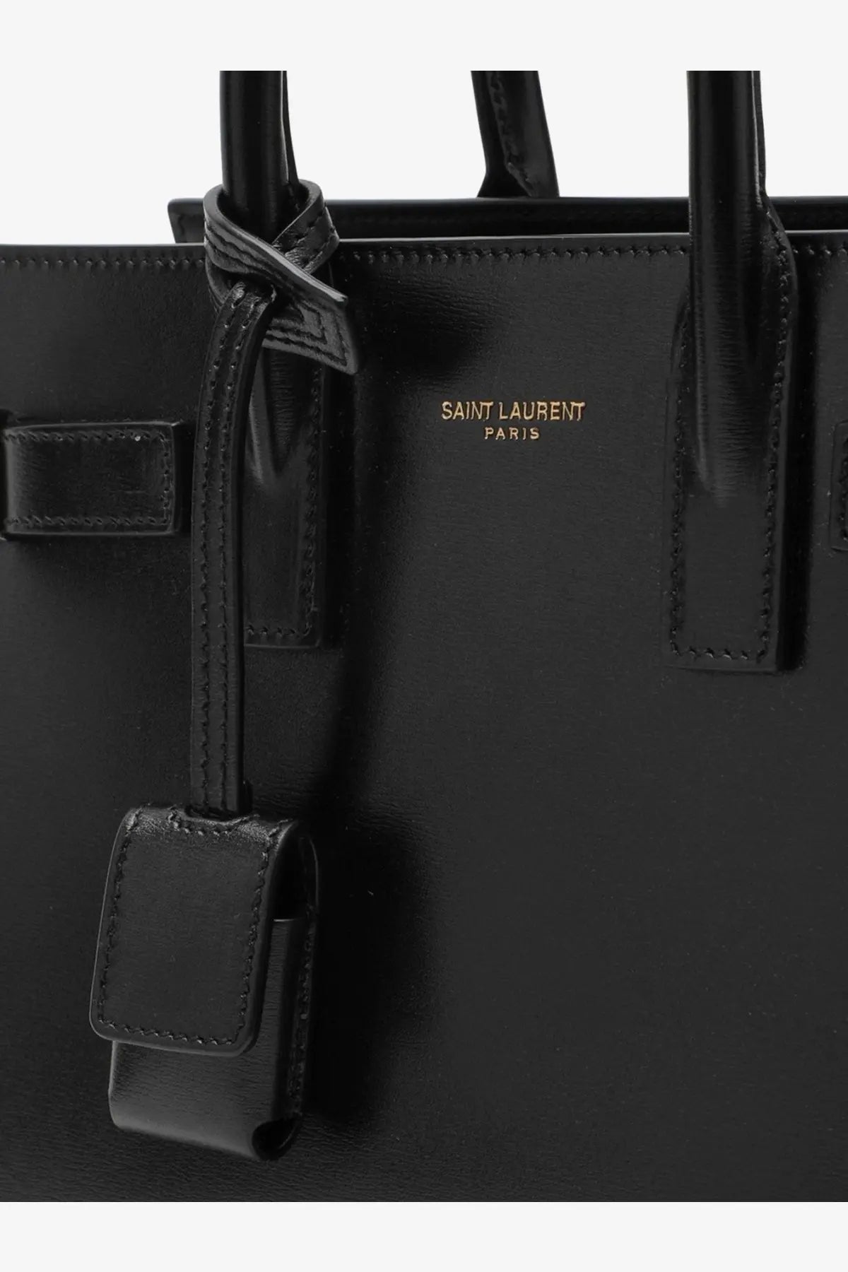 Saint Laurent women’s sac de jour nano black leather tote bag with gold-tone branding and structured handles