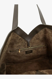 Saint Laurent women’s tote bag in taupe suede with dark brown leather straps and gold-tone zipper details
