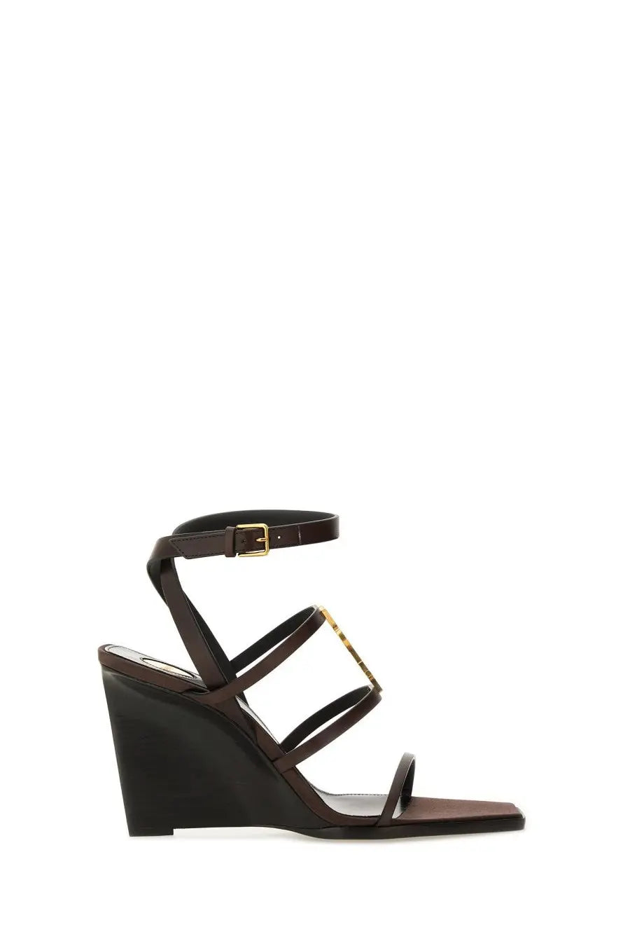 Saint Laurent women’s black leather wedge Cassandra sandal with gold-tone rectangular buckle detail