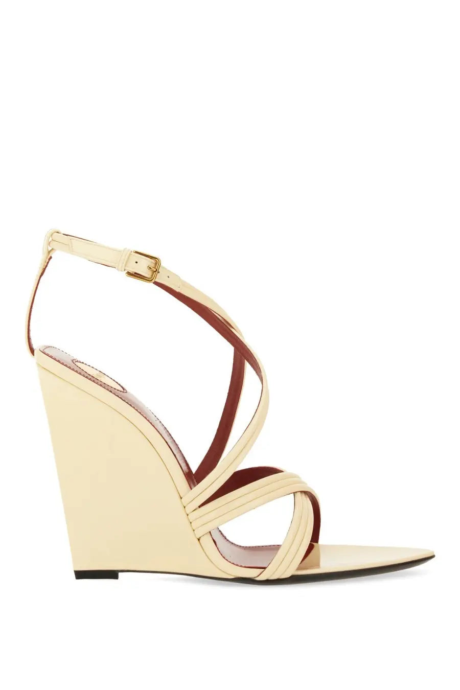 Saint Laurent women’s beige leather wedge sandal with cream thin crisscross straps and gold-tone buckle