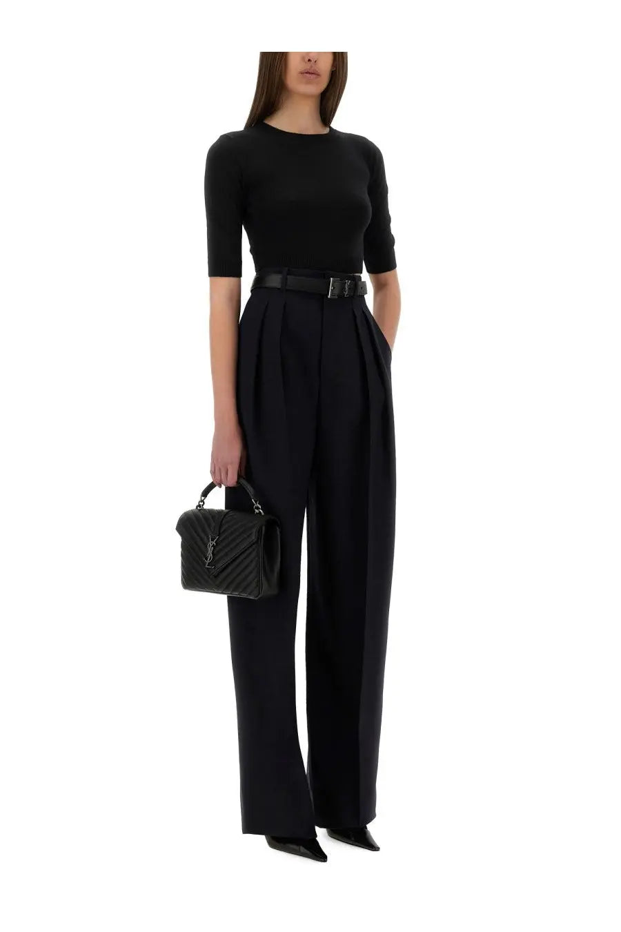 Black quilted leather ysl handbag with silver-tone hardware paired with saint laurent women’s wide leg pants in blue