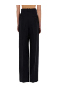 Saint Laurent women’s wide leg pants in grain de poudre blue with a sleek tailored fit and subtle front pockets