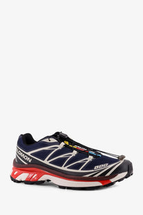 Salomon men’s nylon sneakers in navy blue white and red with gtx waterproof material and rugged trail outsole