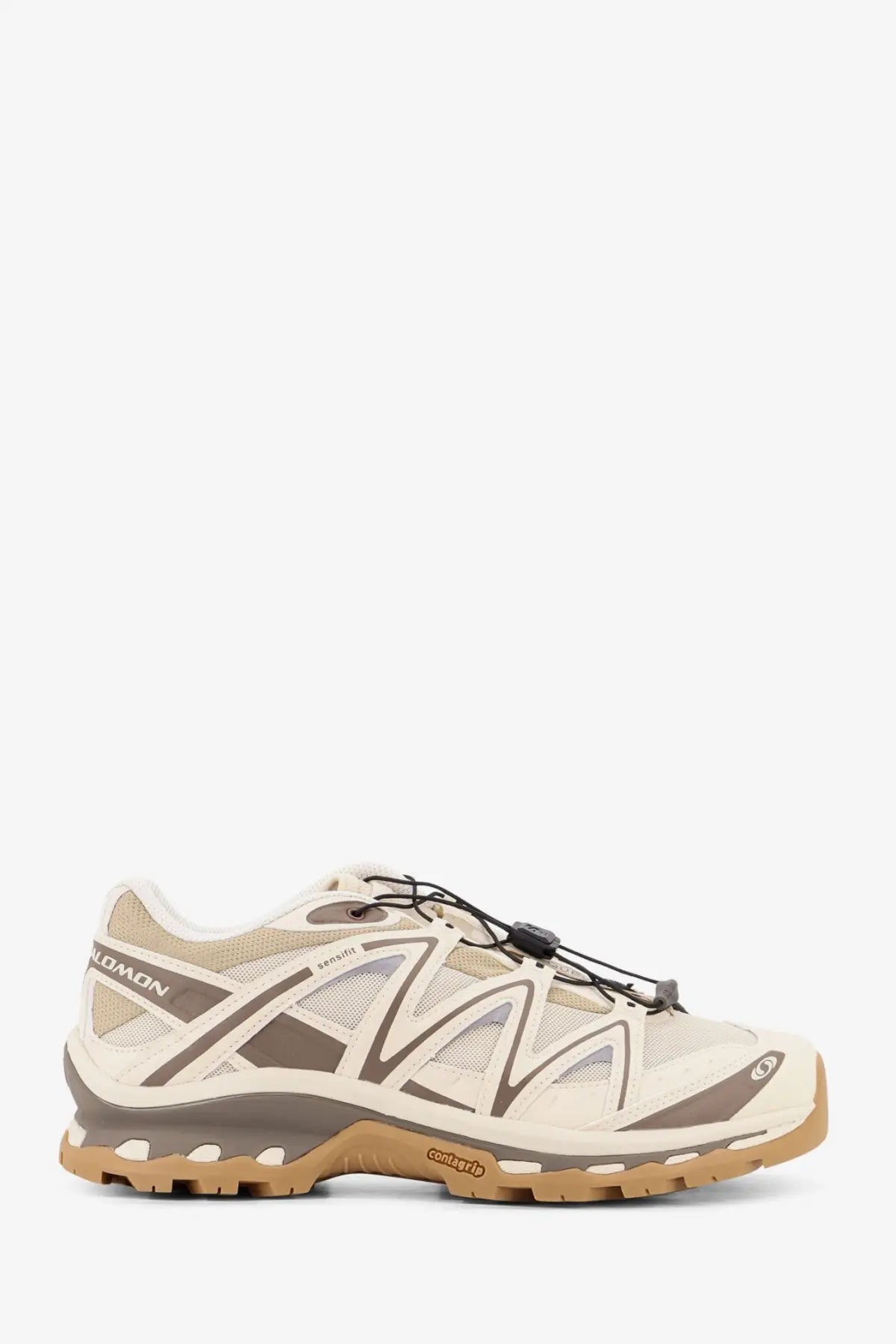 Salomon men’s xt quest low top sneakers in beige and brown with mesh upper rubber outsole and lacing system