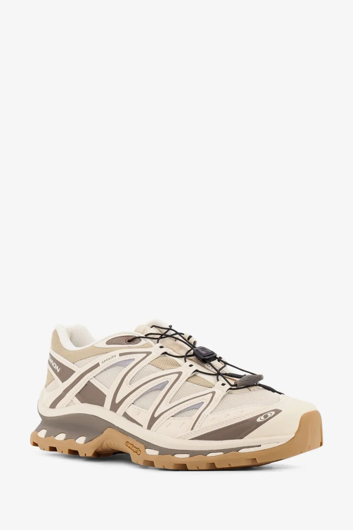 Salomon men’s xt quest low top sneakers in white with beige and brown mesh upper rubber outsole and black laces