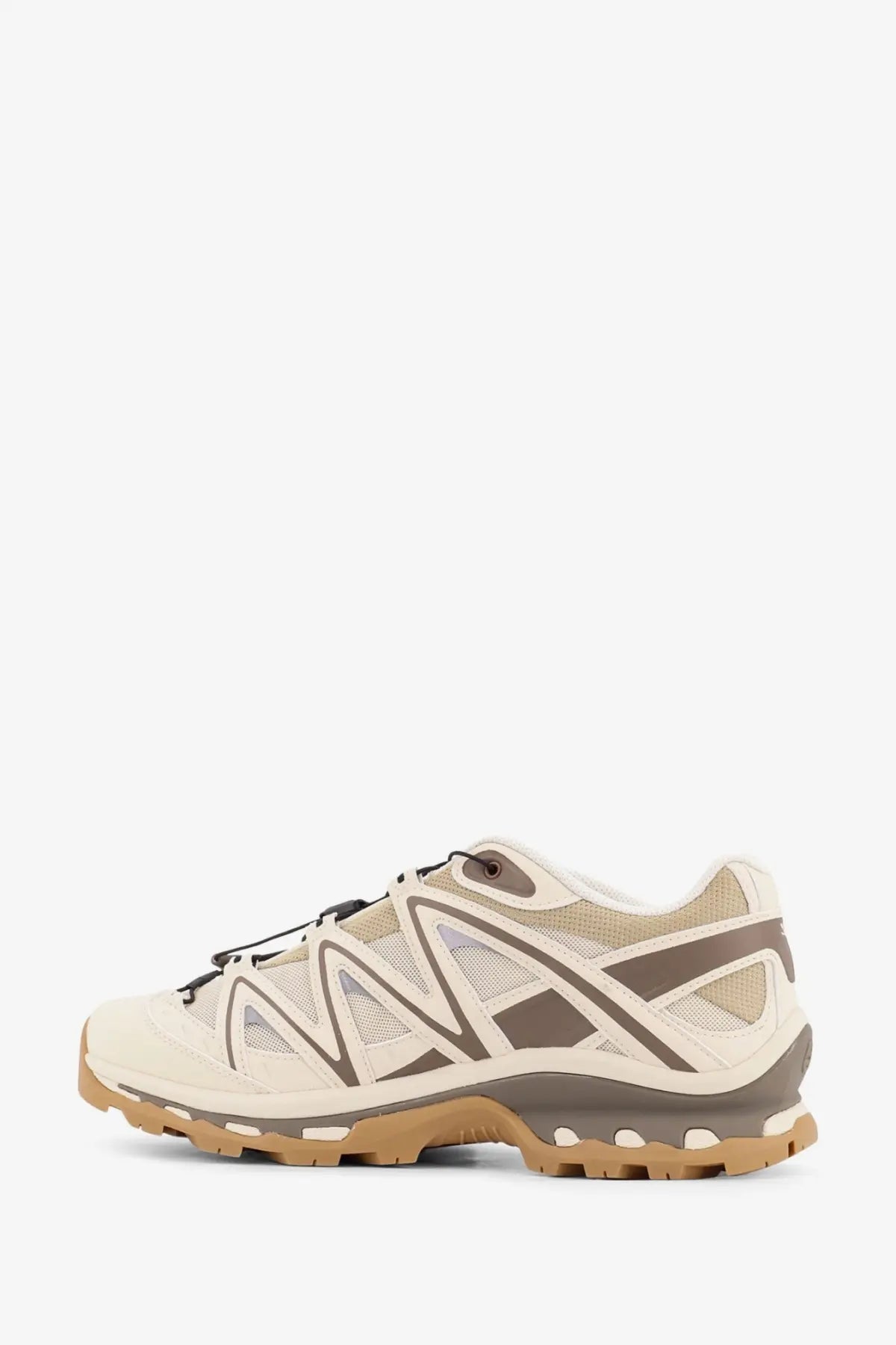 Salomon men’s xt quest low top sneakers in white with beige and brown mesh upper and geometric rubber outsole