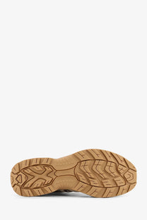Tan rubber sole with rugged textured tread and embossed branding on salomon men’s xt quest mesh low top sneakers white