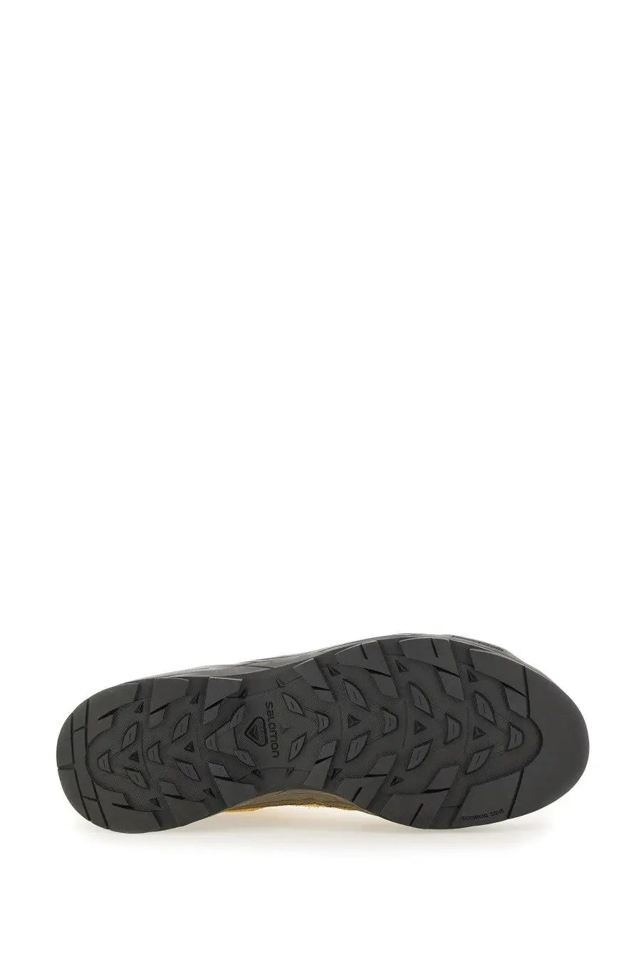 Black rubber sole with textured geometric tread and salomon logo on the heel of salomon unisex alp sneaker beige