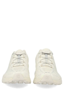A pair of off-white salomon unisex sneaker xt whisper trail running shoes with textured upper and gray laces