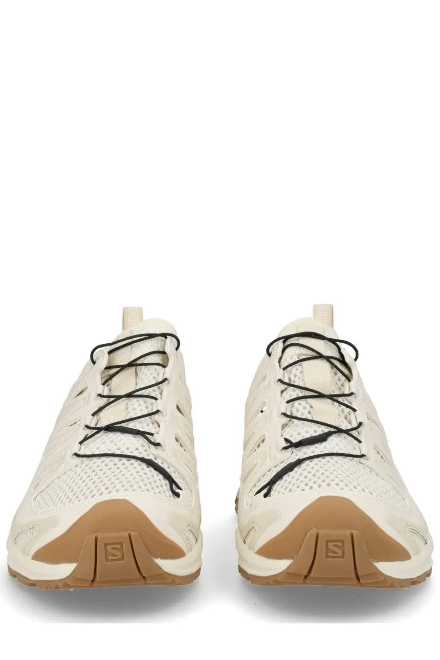 Cream-colored Salomon unisex XA Pro 3D Amphib running shoes with black laces and tan rubber soles for outdoor use