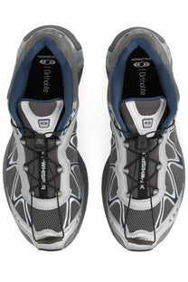 Salomon unisex XT Whisper sneaker in silver with gray and white mesh upper blue accents and black laces
