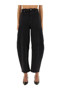Black high-waisted wide-leg denim trousers with a relaxed tapered fit and visible stitching by self-portrait women