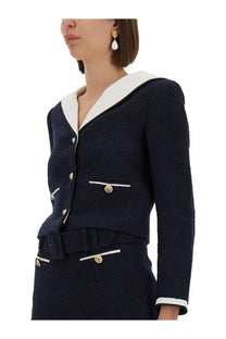 Navy blue self portrait women’s boucle jacket with white collar and cuffs, gold-tone buttons, and matching belt detail