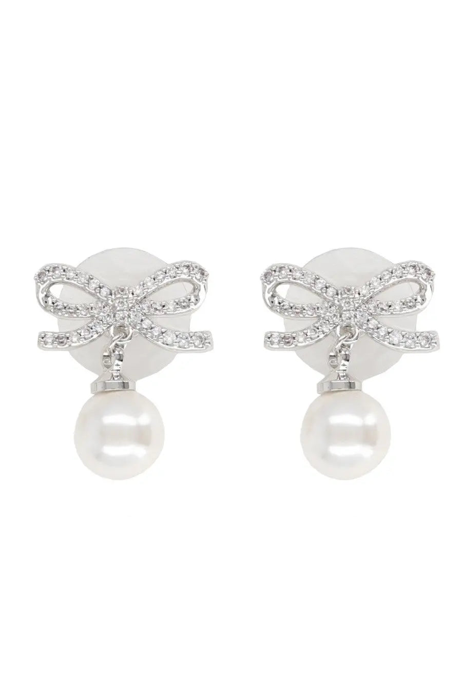 Delicate silver bow earrings adorned with sparkling crystals and dangling white pearls by Self-Portrait women