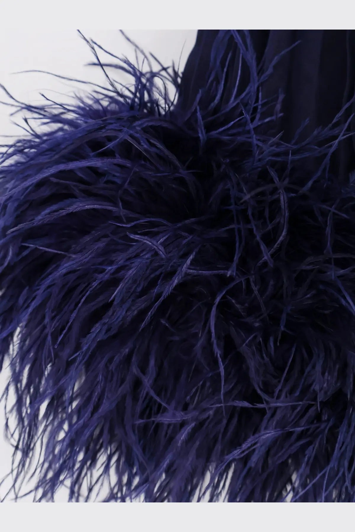 Deep purple feather trim with soft voluminous texture on self-portrait women’s chiffon long blue dress back view