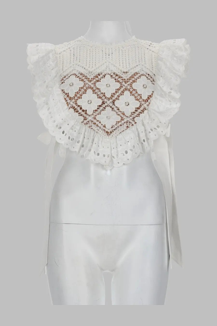 White lace crop top with ruffled sleeves and heart-shaped crochet pattern with rhinestones by self-portrait