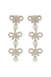 Silver micro bow earrings by self portrait with pearl accents in a drop design for women