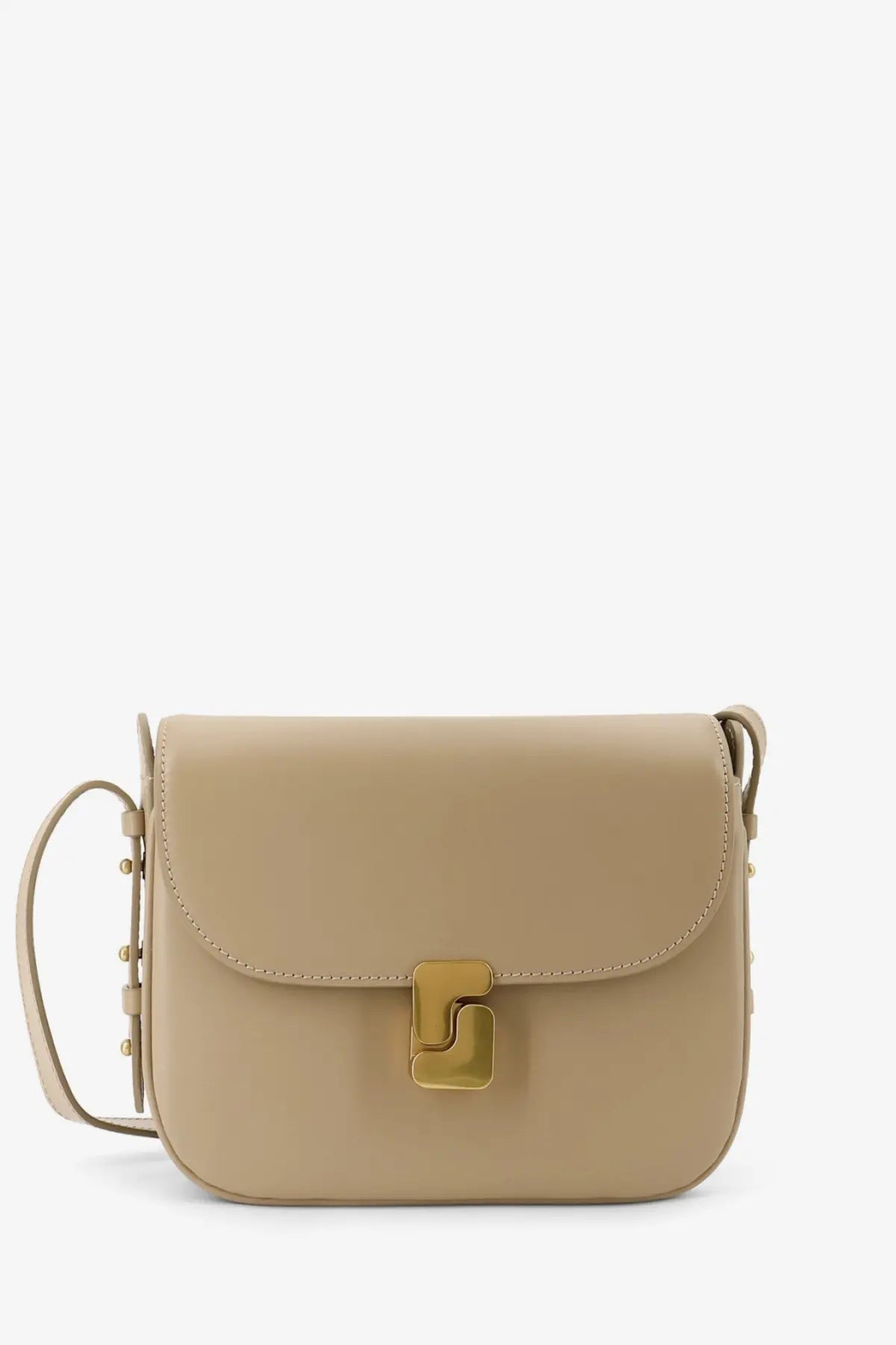 Beige leather crossbody bag by Soeur with gold-tone geometric clasp and adjustable strap for everyday use