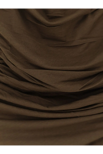 Soeur women’s cotton blend irina top green shown with soft draped brown fabric highlighting gentle folds and subtle sheen