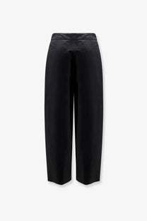 Black high-waisted wide-leg trousers with a sleek tailored silhouette made from organic cotton and linen by soeur