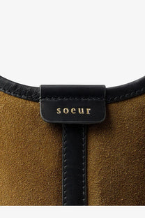 Soeur women’s douce brown suede handbag with black leather strap and gold embossed branding in bronze color