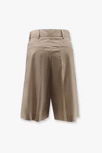 Beige pleated bermuda shorts with tailored waistband and back pockets made from biologic cotton by soeur shown from back