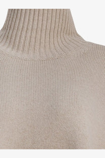 Beige ribbed merino wool turtleneck sweater for women by soeur with fine knit texture in white color