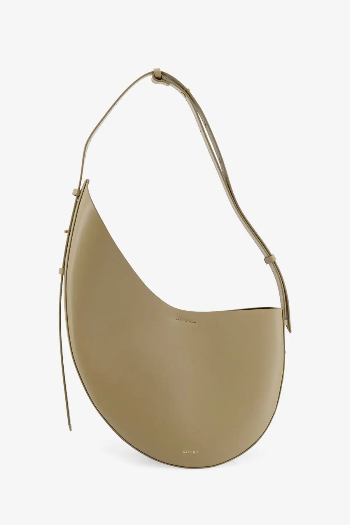 Soeur womens winona leather crossbody bag beige with sleek minimalist curved silhouette and slender adjustable strap