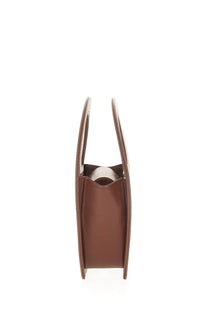 Brown leather Sofia womens mini edda tote bag with rounded top handles and minimalist design