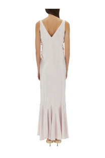 Soft blush-colored sleeveless maxi dress with deep v-back and flared hem from sportmax katia blue collection